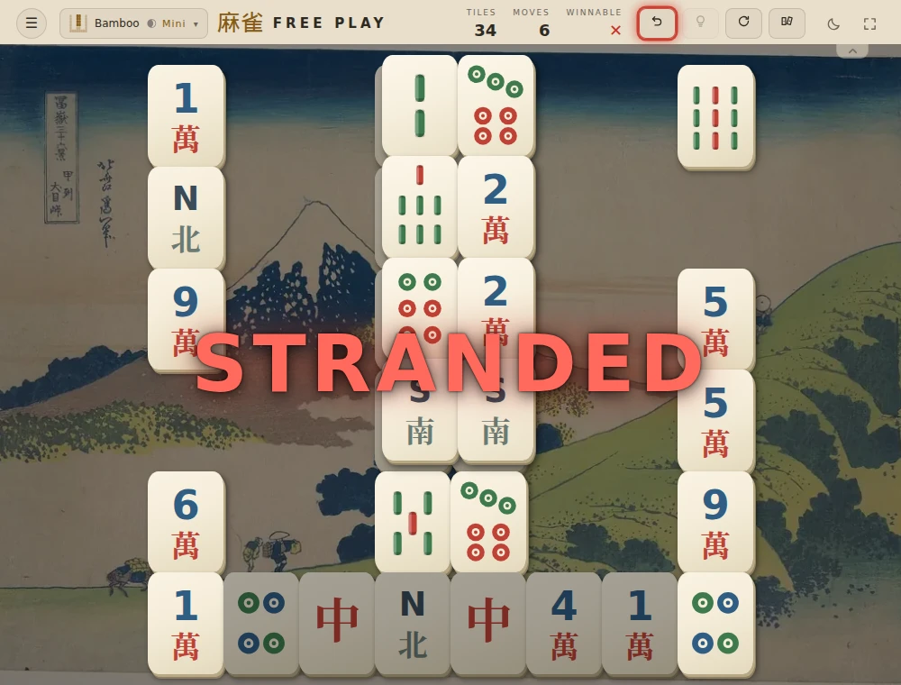 The Bamboo board after matching the two outside Six of Circles, with the large red STRANDED warning across the board.